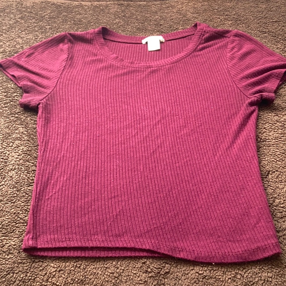 I am selling this purple shirt.